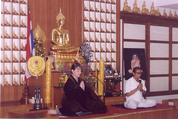 Acharn Helen and Acharn Kampan leading morning chanting  and Dhamma talk at a retreat at YBAT.